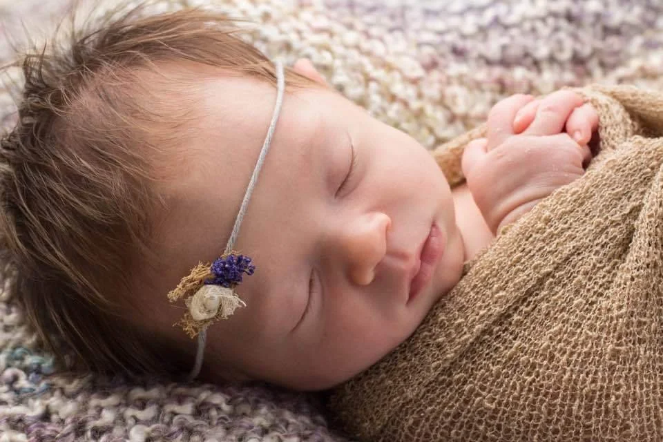 A baby resting comfortably